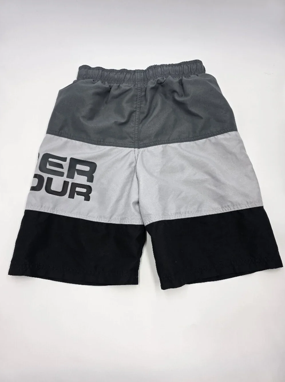 Under Armour boys' rashguard and swim trunks size M